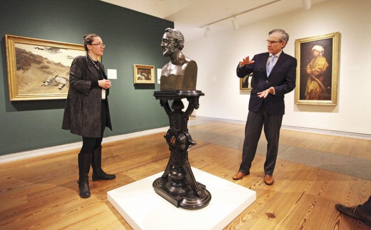 William "Bro" Adams, the National Endowment for the Humanities chairman, discusses a sculpture pedestal with Jessica May, chief curator, during a private tour of the Portland Museum of Art on Friday. "Art is so much a part of the life of Maine, and Portland is the place in Maine where people come to experience it. Our investment helps give people more access to great art," Adams said.