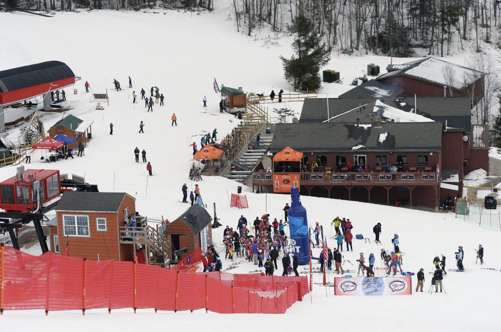 Skiers and spectators congregate near the finish line of the World Ski Tour's initial event at Sunday River. The president of the Tour, Ed Rogers of Bath, now has video of a race that he can present to potential sponsors.