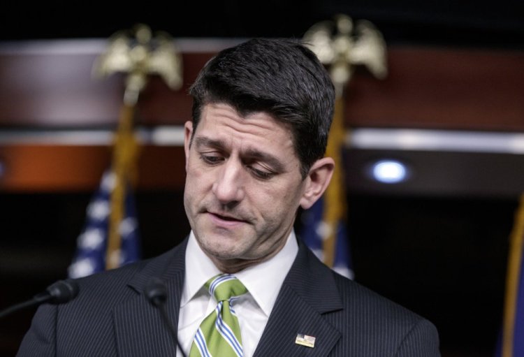 House Speaker Paul Ryan pauses Friday as he announces that he is abruptly pulling the Republican health care overhaul bill off the House floor.