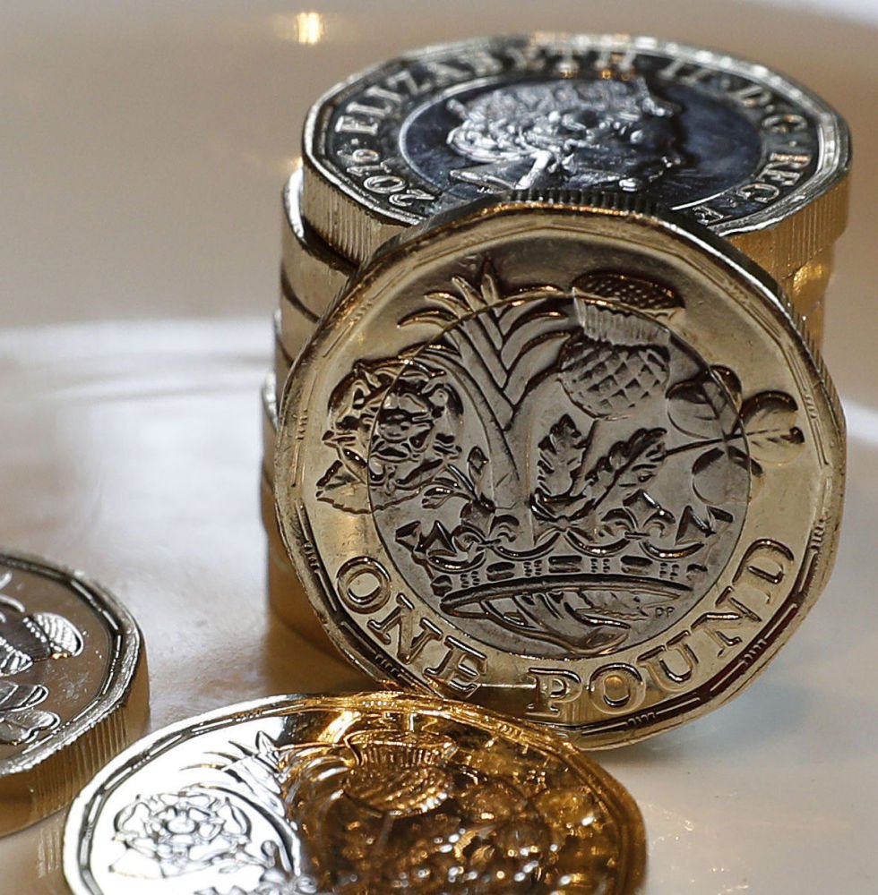 Britain's new 12-sided pound coin is intended to be hard to counterfeit and works just fine in vending machines.