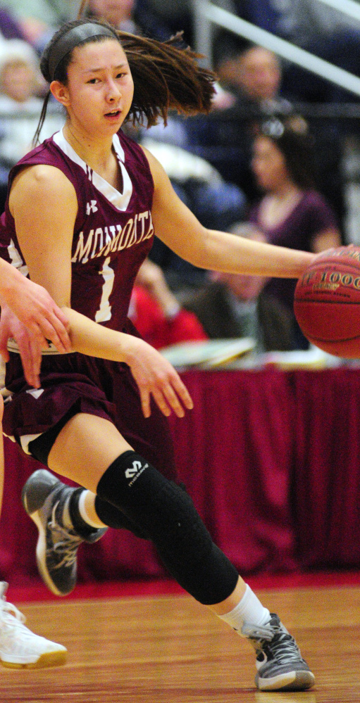 Monmouth's dribbles the ball against Boothbay during a Class C semifinal game last week at the Augusta Civic Center.