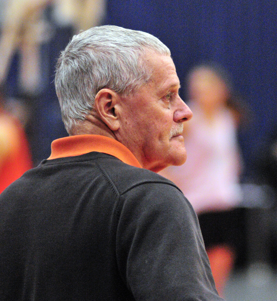 Brunswick volunteer coach Conrad Lewis watches as the team practices Thursday at the Augusta Civic Center.