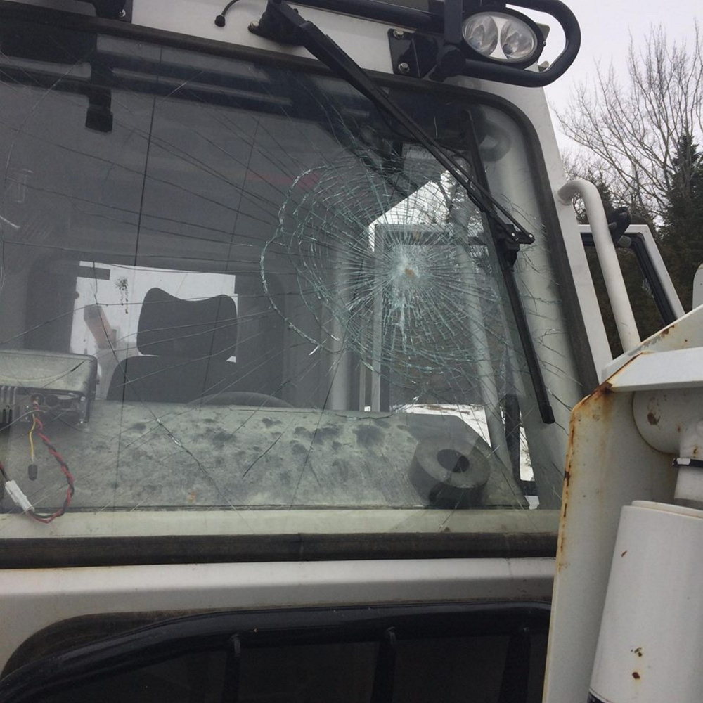A Clinton Police Department photo shows vandalism reported to Central Maine Power Co. trucks that were parked off Route 23 near power lines.