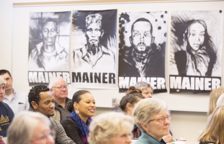 Kennebec Community College student Flavia Oilveira sits with her husband, Nelson Oliveira, during a Lunch and Learn at the Holocaust and Human Rights Center of Maine titled, "This is ME, Too: From Everywhere to New Mainer" Monday in Augusta.