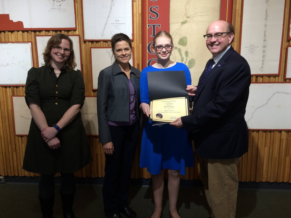 Maine Virtual Academy history teacher, Kristen Tripp, left with Maine District 18 Senator Lisa Keim, first place high school division winner Victoria Hamel, and Maine Secretary of State Matthew Dunlap.