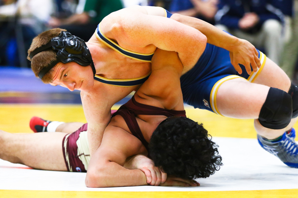 Dan Del Gallo, of the University of Southern Maine, wrestles Walter Ordnez of Springfield Technical during a match this season.