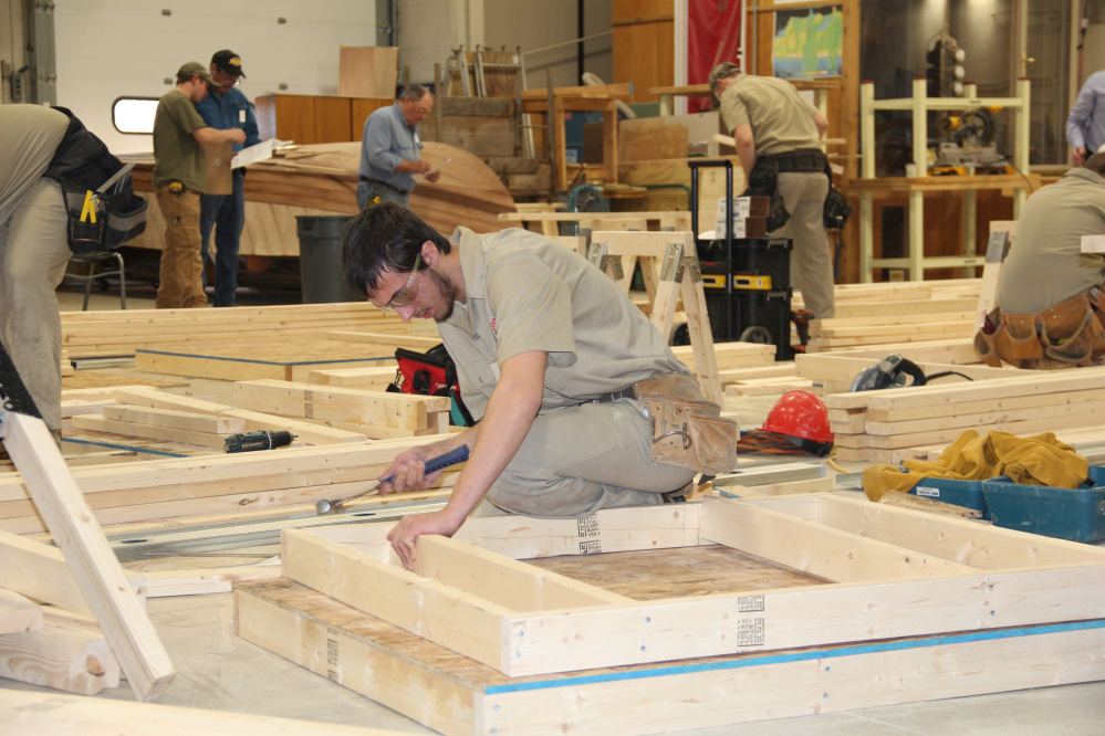 Adam Fisher from Messalonsee High School competing in the carpentry competition at the SkillsUSA Championships hosted by Eastern Maine Community College and United Technology Center in Bangor.