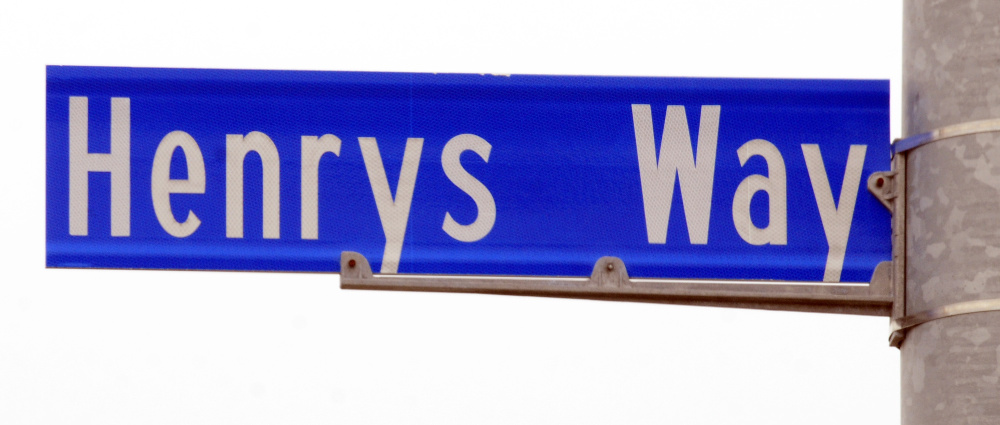 This photo taken Friday shows the Henrys Way road sign across Old Belgrade Road from MaineGeneral Medical Center in north Augusta.