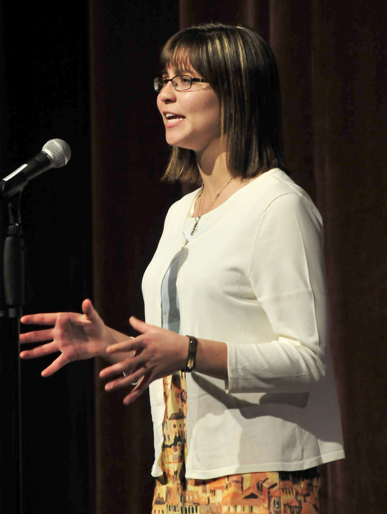 Gabrielle Cooper of Gardiner Area High School competes in the Poetry Out Loud finals at the Waterville Opera House on Monday and was later announced as the winner. Cooper will move on to national competition in Washington, D.C. The event is organized by the National Endowment for the Arts and Poetry Foundation and administered by the Maine Arts Commission.