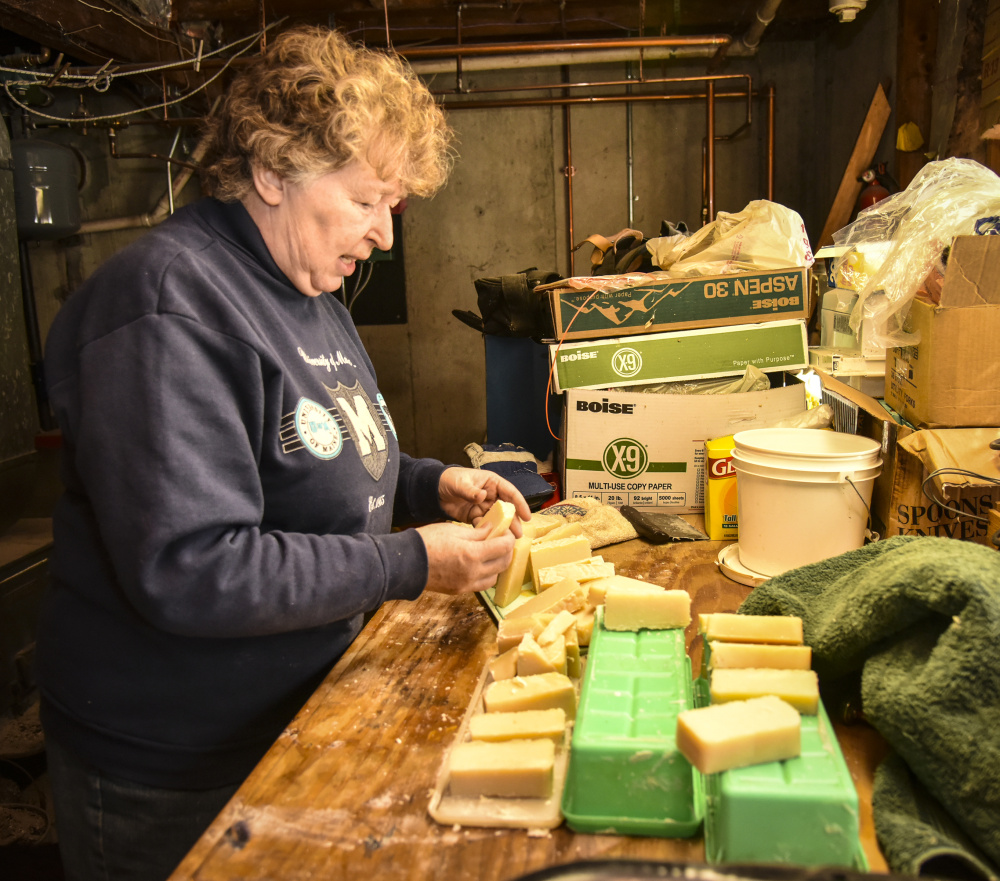 For Elaine Briggs, of Wayne, aging in place means continuing to do the hobbies and crafts she enjoys doing in her own home. She is shown Sunday with her with spearmint- and lavender-infused soap that she made in the basement of her home.