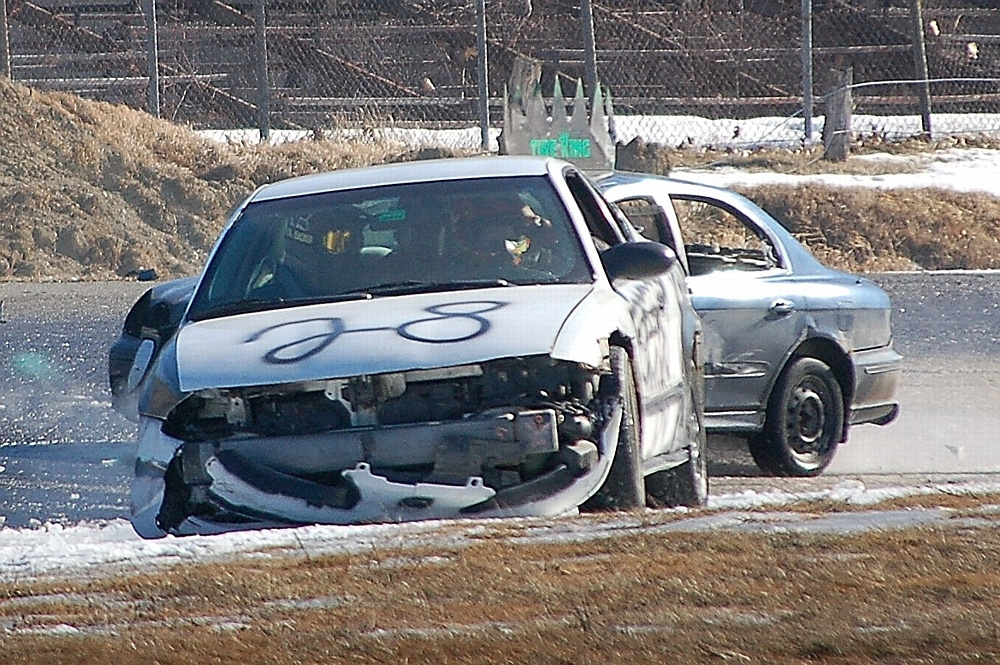 Cars get tangled up during a Snowbowl Enduro 100 race at Unity Raceway on March 5.