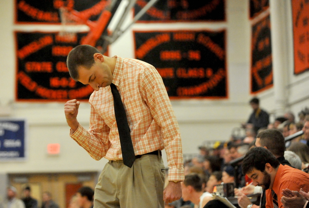 Winslow High School boys basketball coach Jared Browne celebrates a 3-pointer during a Jan. 2, 2015 game against Medomak. Browne said he has resigned.