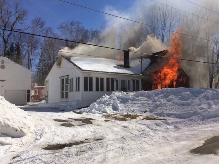 A second home at 30 Mill Road in Jackman is engulfed by fire Sunday afternoon in a photo provided by the Jackman-Moose River Fire Department.