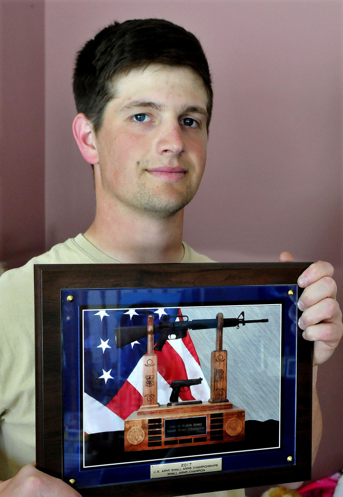 National Guardsman Max Nickerson, of Winslow, holds an award certificate he was presented at the U.S. Army Small Arms Championships competition. The award was for overall proficiency with both a rifle and a hand gun.