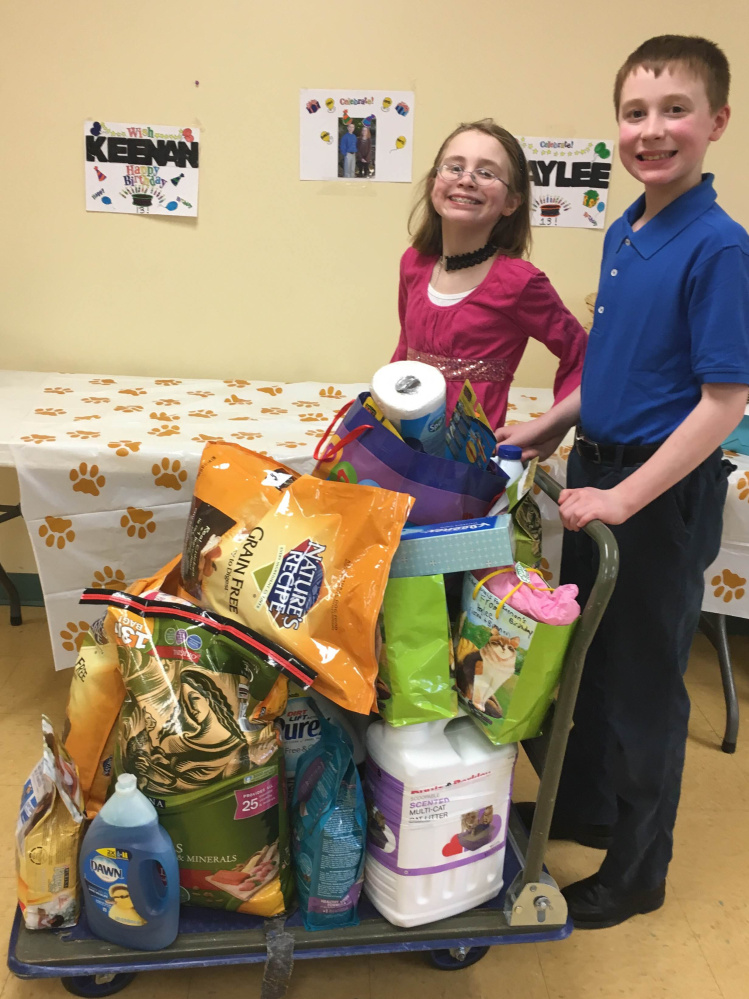 Twins Haylee and Keenan Sodoma, 13, of Sidney, celebrated their 13th birthday Feb. 27 at the Humane Society Waterville Area in Waterville. The twins asked that guests bring gifts for the animals instead of for themselves.