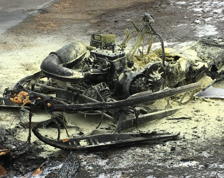 This snowmobile was destroyed Friday morning after bursting into flames in a garage off China Road in Winslow.