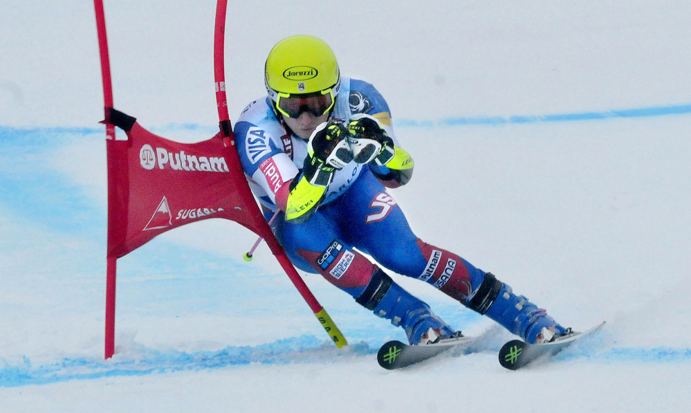 Tim Jitloff skis around a gate toward the finish line during a giant slalom race at the U.S. Alpine Championships Tuesday at Sugarloaf Mountain.