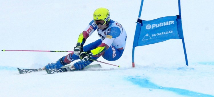 Tim Jitloff skis around a gate toward the finish line during a giant slalom race at the U.S. Alpine Championships Tuesday at Sugarloaf Mountain.