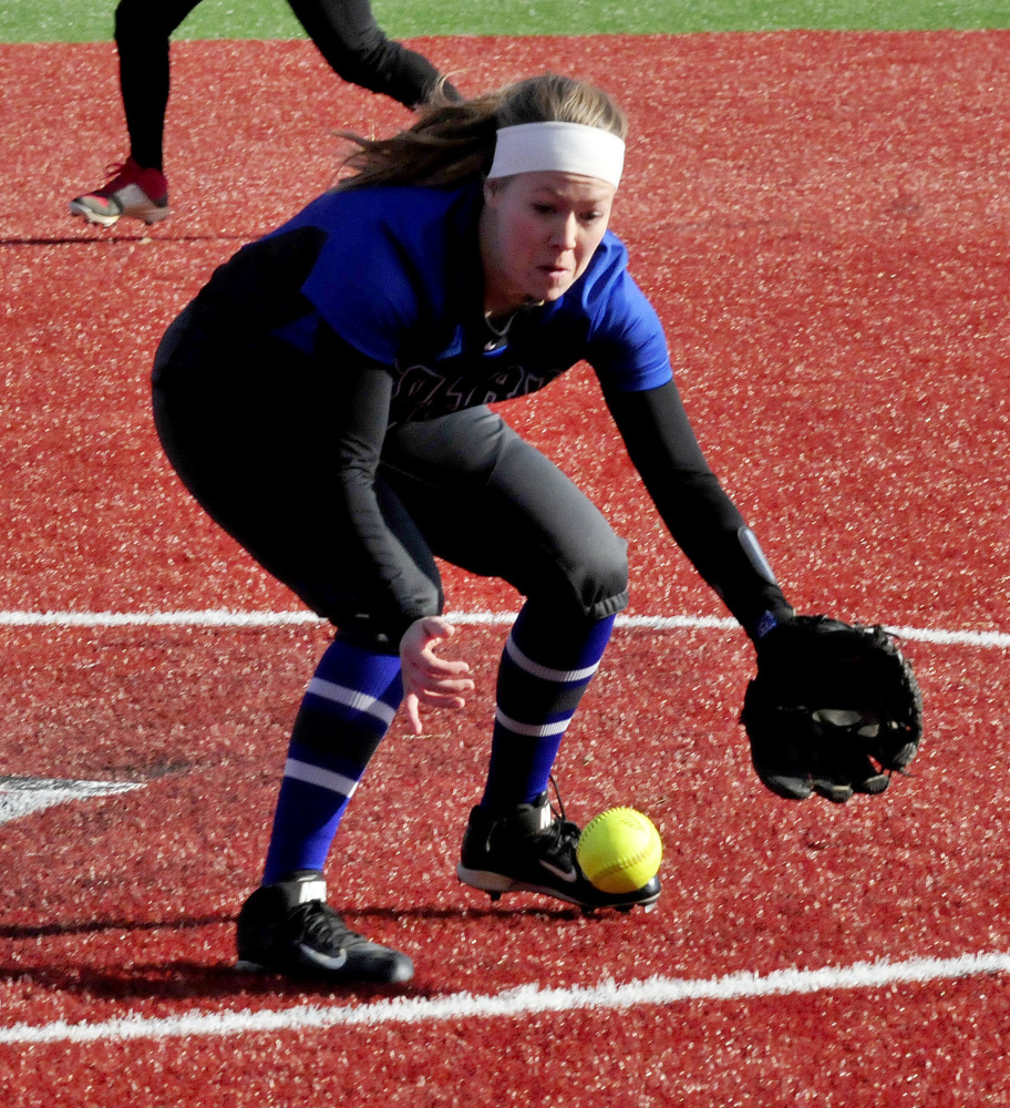 Colby pitcher Julia Saul fields a grounder against Thomas on Thursday in Waterville.