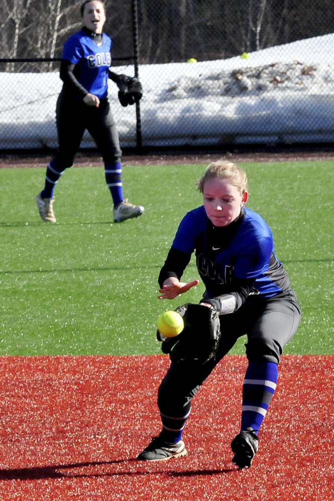 Colby's Robin Spofford catches a line drive against Thomas on Thursday in Waterville.