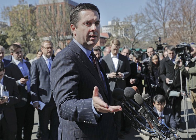 House Intelligence Committee Chairman Rep. Devin Nunes, R-Calif, speaks with reporters outside the White House following a meeting with President Trump on March 22. 