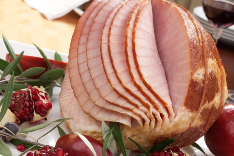 Baked spiral-sliced ham with apple-ginger glaze is best served warm, not hot.
