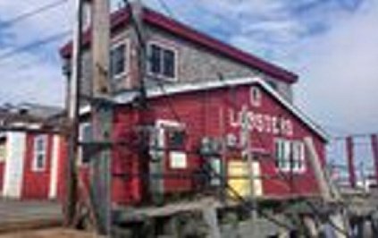 The lobster wharf next to Cook's Lobster & Ale House on Bailey Island in Harpswell will be sold at bankruptcy auction on April 25 to satisfy debts owed by the owner.