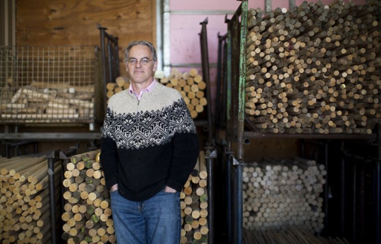 Simon Varney, co-owner of Wells Wood Turning & Finishing, poses for a portrait at the mill. Buzz from recent coverage of the White House's inattention to the annual Easter Egg Roll has brought the company an increase in business.