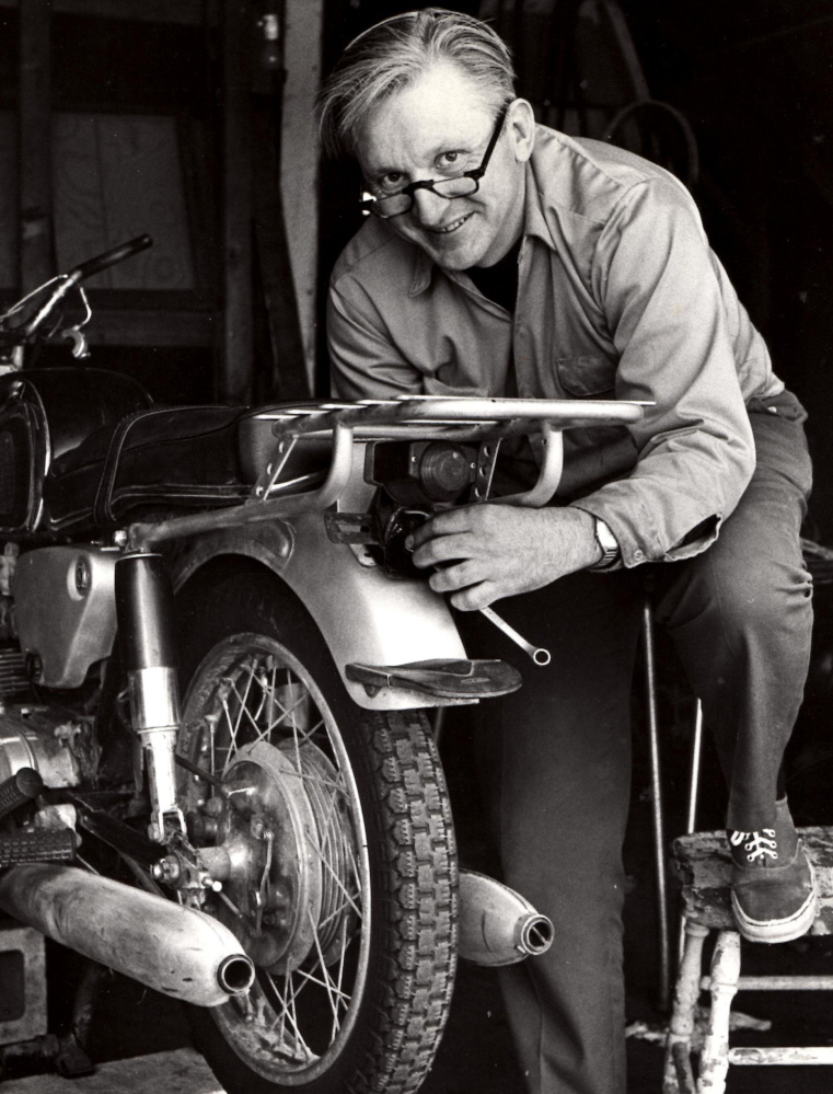Robert Pirsig works on a motorcycle in 1975. Pirsig, who wrote the classic "Zen and the Art of Motorcycle Maintenance," lived in South Berwick for 30 years.