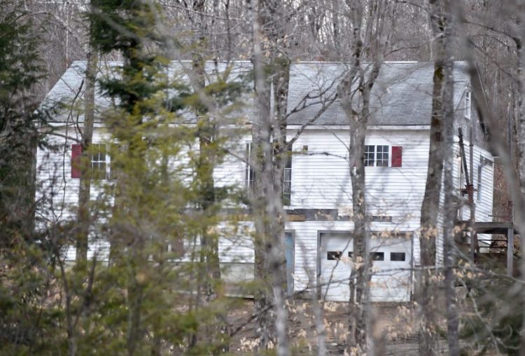 Maine State Police investigators block off McNally Road in St. Albans as they investigate the death of Randy Erving, 53, who was killed on April 8, 2016. Jeremy Erving, 24, a nephew of Randy Erving, is charged in connection with his uncle's death.