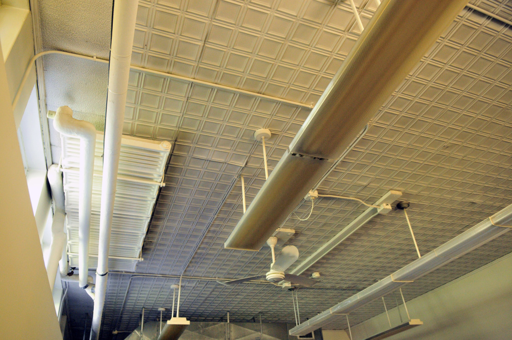 Original pressed metal ceilings in the Central Building are seen during a tour on Oct. 7, 2016, at Stevens Commons in Hallowell.