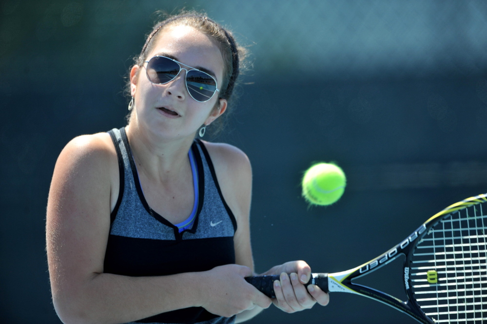 Winthrop's Megan Chamberland returns a shot during a match against Brewer's Catelyn Kimball in the Round of 48 stage singles tournament last season at Colby College in Waterville.