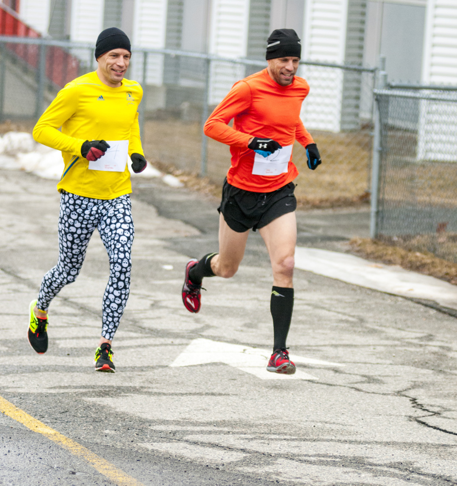Ward Boudreau, left, and twin brother Wade Boudreau were off to an early lead in the Tiger 5k Run last Saturday at Gardiner Area High School. They're both going to be running the Boston Marathon on Monday.