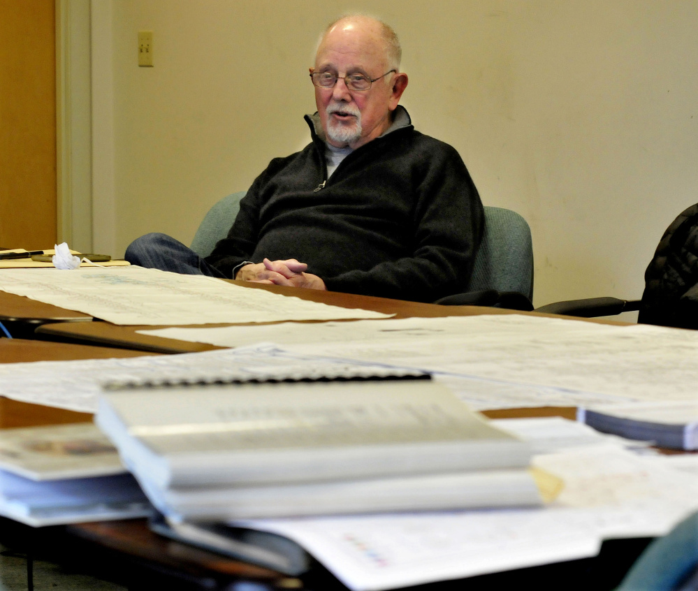 Surrounded by documents and schematics of Madison Paper Industries mill equipment Wednesday, Jerome Epstein, chairman of Perry Videx company, described efforts to liquidate the former Madison mill company assets.