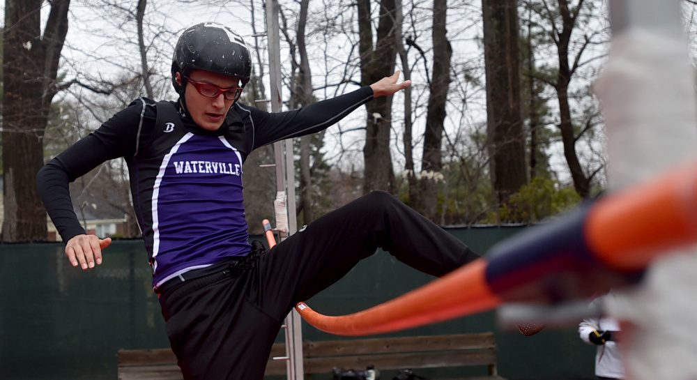 Waterville Senior High School's Taylor Bielecki knocks over the clearing bar on his first attempt on the pole vault at the Waterville Relays on Saturday in Waterville.