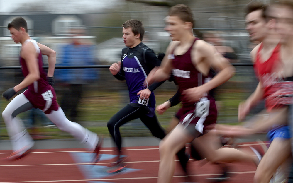 Waterville Senior High School's Connor Dolan, left center, competes in the 1,600 meter run at the Waterville Relays on Saturday in Waterville.