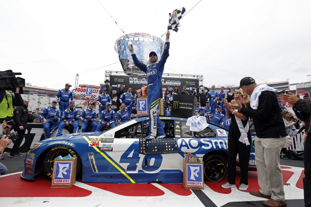 Driver Jimmie Johnson celebrates after winning the Monster Energy NASCAR Cup Series rac, Monday in Bristol, Tennessee.