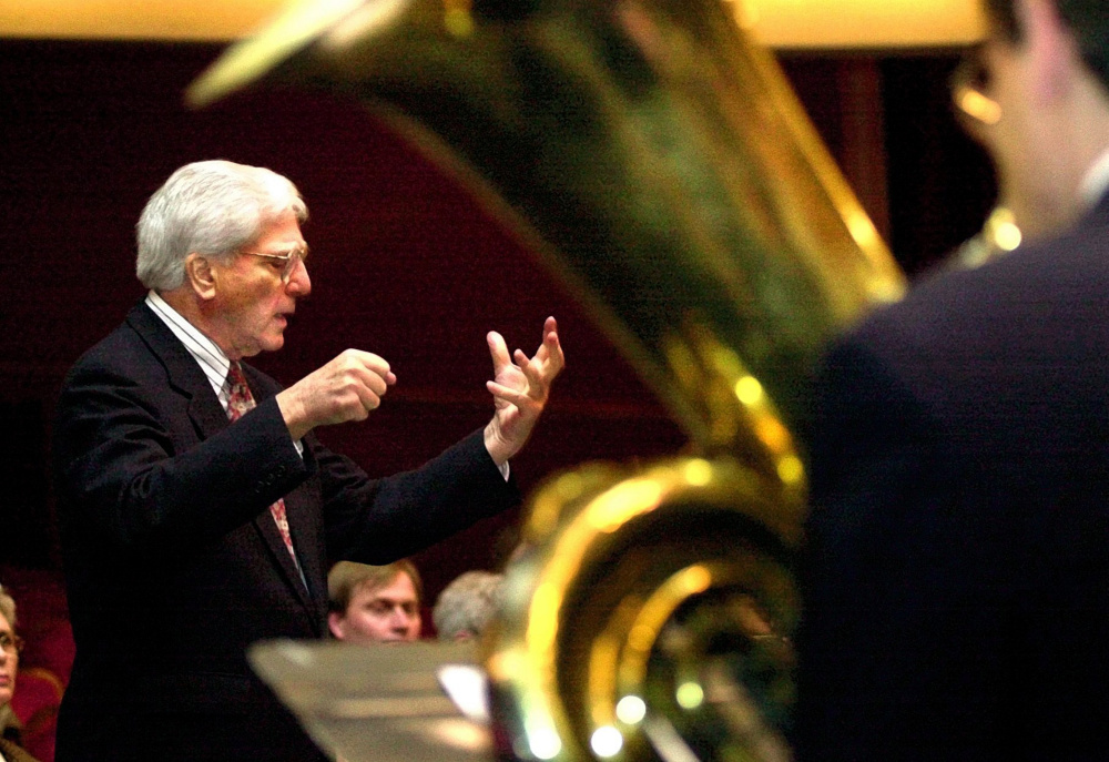 Peter Ré conducts an orchestra through "Fanfare for the Waterville Bicentennial," which he composed for the city's 200th anniversary celebration, in 2002. The Colby College Symphony Orchestra's final concert of the school year is dedicated to Ré, who by all accounts made the Colby music department a viable academic unit on campus.
