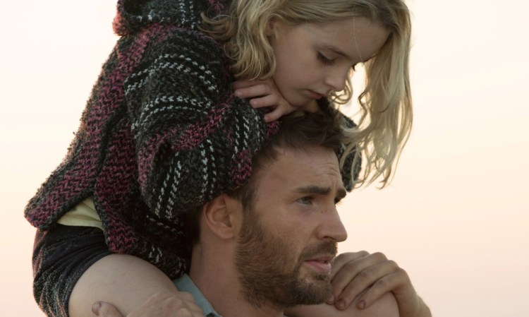 Mckenna Grace on the shoulders of Chris Evans in "Gifted."