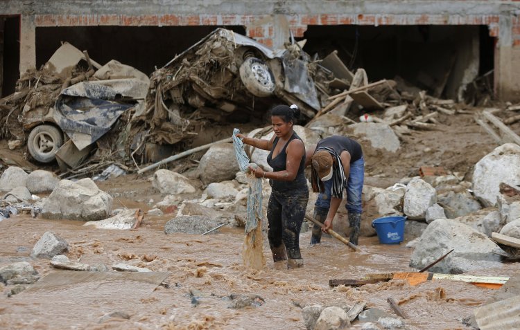 Survivors recover their belongings in Mocoa, Colombia, on Sunday.