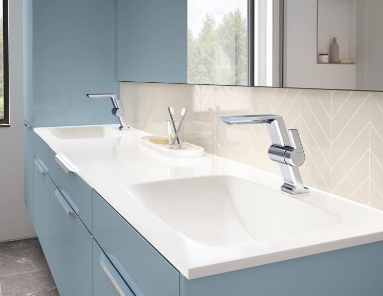 The Pivotal single-handle bath faucet serves as a beautiful centerpiece for the vanity.