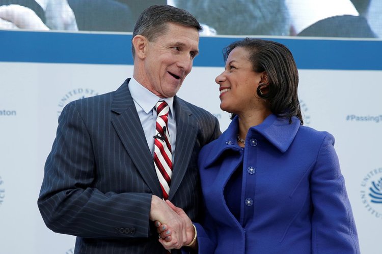 Then-White House National Security Adviser Susan Rice shakes hands with Michael Flynn, who had been Defense Intelligence Agency director under Obama and would briefly serve as Trump's national security adviser, at a U.S. Institute of Peace conference in Washington on Jan. 17, 2017. 