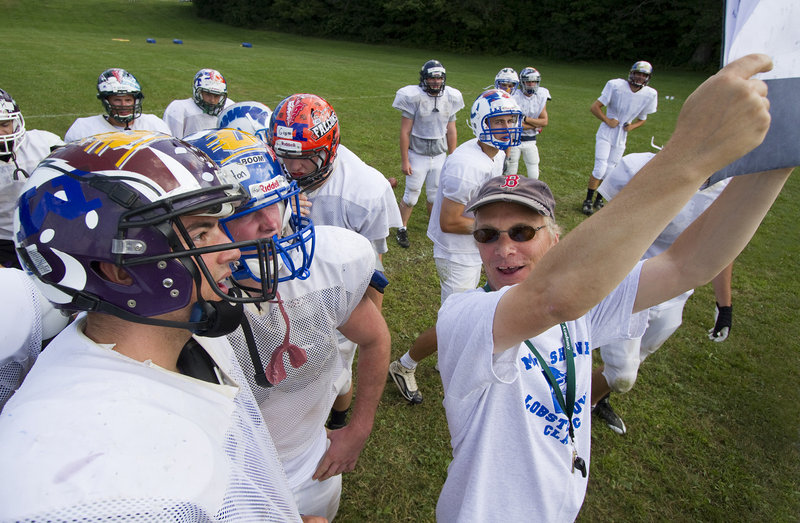 Western Maine Head Coach Jimmy Alyward calls a play during practice and media day at Hebron Academy in Hebron, Maine on Tuesday, July 19, 2011.
