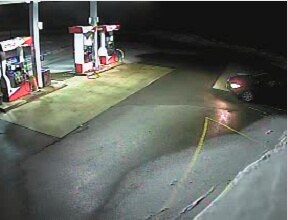 A surveillance photo from Annie’s Market in Sidney shows a blue car that police believe was driven by the suspect who damaged the convenience store early Sunday morning.