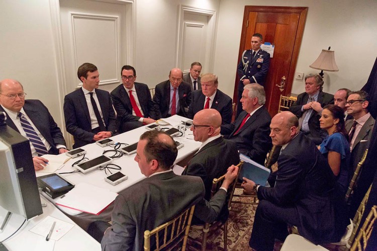 President Trump and his  national security team are briefed via videoconference by Gen. Joseph Dunford, chairman of the Joint Chiefs of Staff, on the missile strike on Syria. The meeting took place in the Sensitive Compartmented Information Facility at Trump's Mar-a-Lago resort in West Palm Beach. White House Press Secretary Sean Spicer said the image was digitally edited for security purposes.