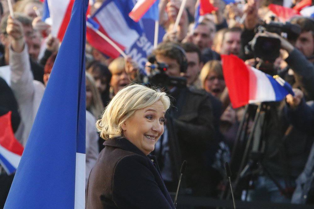 French far-right presidential candidate Marine Le Pen addresses people Thursday in northern France. She claimed an "ideological victory" for her populist, anti-immigrant campaign.