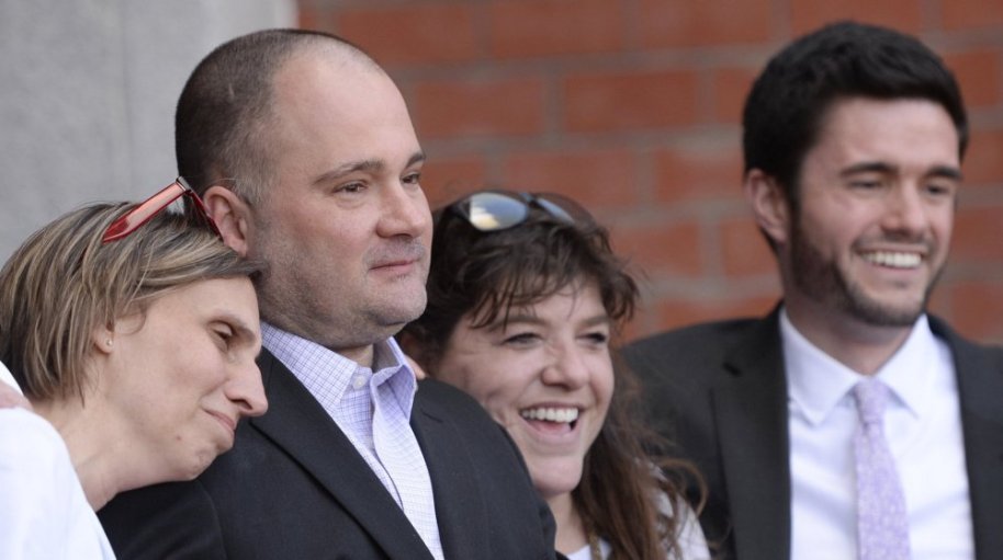 Justice Joyce Wheeler has ordered a radio station and a TV station to produce outtakes of interviews with the prosecutor in the case of  Anthony Sanborn Jr., second from left, as he challenges his conviction in the 1989 murder of Jessica L. Briggs. Sanborn's wife, Michelle, left, his attorney Amy Fairfield and paralegal Keegan Fairfield accompanied him April 13 as he was freed on bail set by Wheeler.