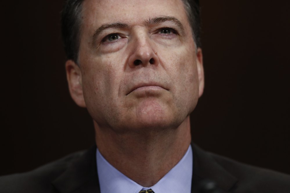 James Comey pauses as he testifies May 3, 2017 on Capitol Hill before the Senate Judiciary Committee. President Trump abruptly fired Comey on Tuesday, ousting the nation's top law enforcement official in the midst of an investigation into whether Trump's campaign had ties to Russia's election meddling.