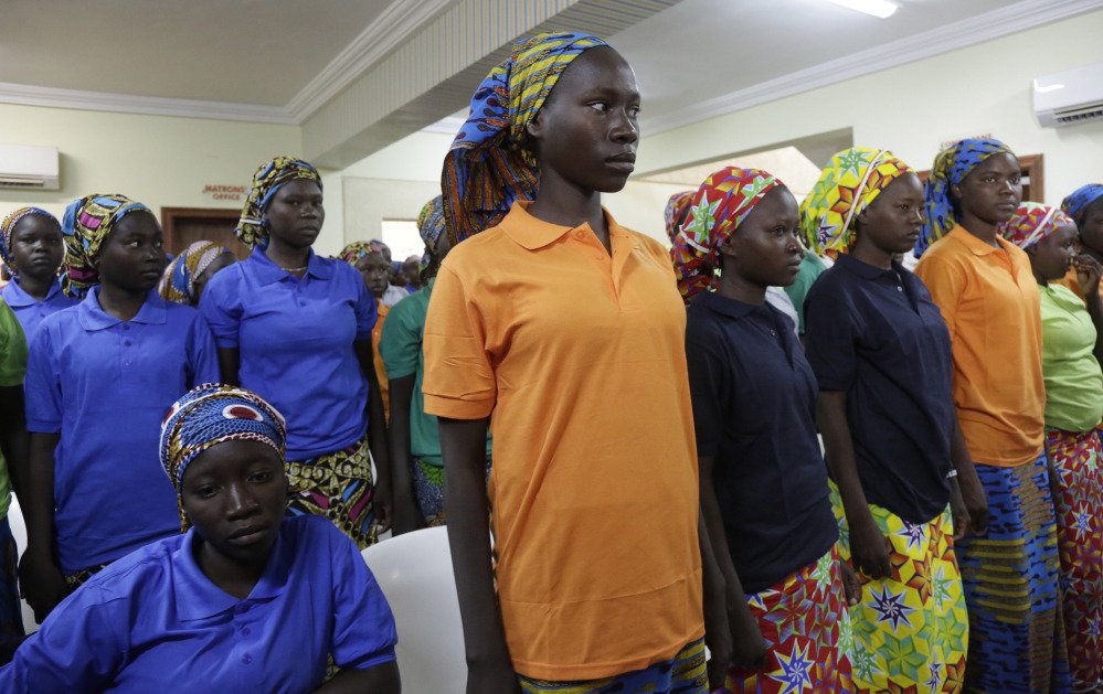 Chibok schoolgirls, recently freed from Nigeria extremist group Boko Haram captivity, are photographed in Abuja, Nigeria, earlier this week.
