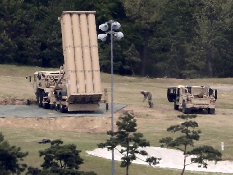 A U.S. missile defense system called Terminal High Altitude Area Defense, or THAAD, is installed on a golf course in Seongju, South Korea, this month.